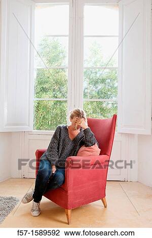 Woman lost in thought View Large Photo Image Stock Image - Woman lost in thought. Fotosearch