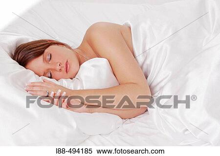 Woman lying in bed. View Large Photo Image Stock Photography - Woman lying in bed.. Fotosearch