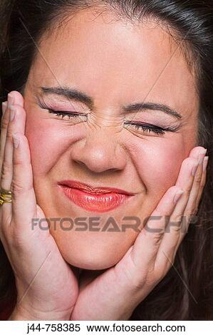 Stock Photography - Woman making a funny face, Close up, Portrait. Fotosearch