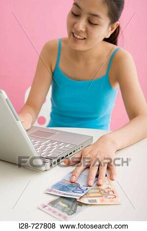 Woman Making Money from stock market View Large Photo Image Stock Photo - Woman Making Money from stock market. Fotosearch