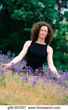 Woman meditating View Large Photo Image Stock Photo - Woman meditating. Fotosearch