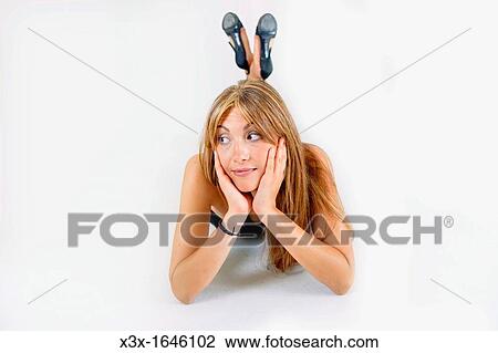 Woman model looking sideways on the floor View Large Photo Image Stock Image - Woman model looking sideways on the floor. Fotosearch