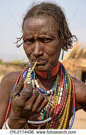 woman of the Arbore tribe in the Lower Omo Valley of Ethiopia. View Large Photo Image Stock Photograph - woman of the Arbore tribe in the Lower Omo Valley of Ethiopia.. Fotosearch
