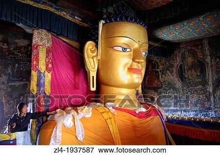 Woman offering a khata to Buddha, Shey monastery. India, Jammu and Kashmir, Ladakh, Shey. Model Released. View Large Photo Image Stock Photo - Woman offering a khata to Buddha, Shey monastery. India, Jammu and Kashmir, Ladakh, Shey. Model Released.. Fotosearch
