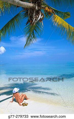 Woman on a beach. Ari Atoll, Maldives View Large Photo Image Stock Image - Woman on a beach. Ari Atoll, Maldives. Fotosearch