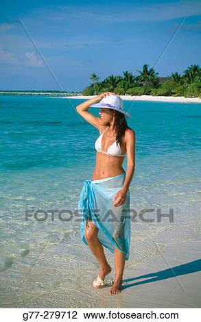Woman on a beach in Ari Atoll. Maldives View Large Photo Image Stock Image - Woman on a beach in Ari Atoll. Maldives. Fotosearch