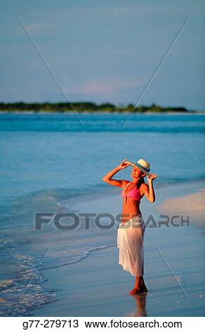 Woman on a beach in Ari Atoll. Maldives View Large Photo Image Stock Image - Woman on a beach in Ari Atoll. Maldives. Fotosearch