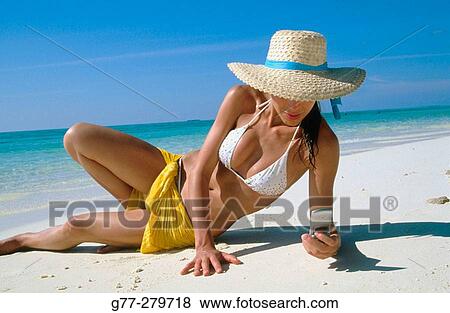 Woman on a beach. White Sands Resort and Spa. Ari Atoll. Maldives View Large Photo Image Stock Photo - Woman on a beach. White Sands Resort and Spa. Ari Atoll. Maldives. Fotosearch