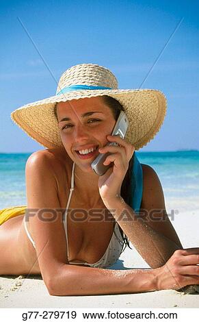 Woman on a beach. White Sands Resort and Spa. Ari Atoll. Maldives View Large Photo Image Stock Photo - Woman on a beach. White Sands Resort and Spa. Ari Atoll. Maldives. Fotosearch