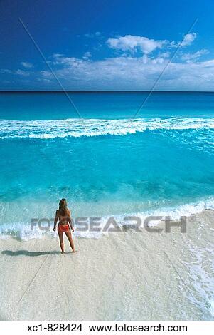 Woman on Beach, Caribbean Sea, Cancun, Mexico View Large Photo Image Picture - Woman on Beach, Caribbean Sea, Cancun, Mexico. Fotosearch