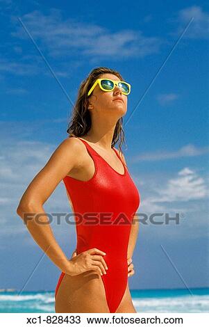 Stock Image - Woman on Beach, Caribbean Sea, Cancun, Mexico. Fotosearch