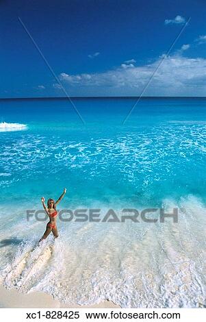Woman on Beach, Caribbean Sea, Cancun, Mexico View Large Photo Image Stock Photography - Woman on Beach, Caribbean Sea, Cancun, Mexico. Fotosearch