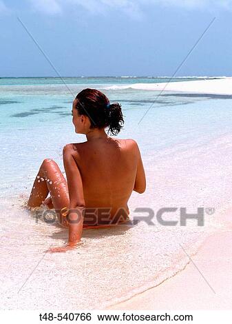 Woman on beach, Los Roques. Venezuela View Large Photo Image Stock Photograph - Woman on beach, Los Roques. Venezuela. Fotosearch