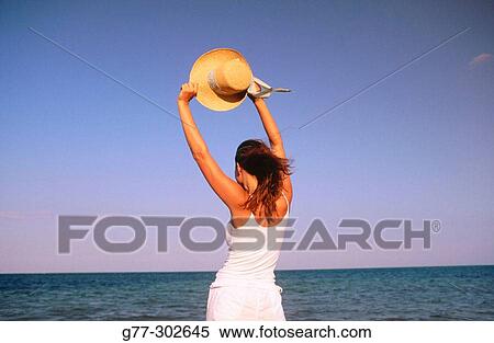 Stock Photography - Woman on beach. Miami. Florida. Fotosearch