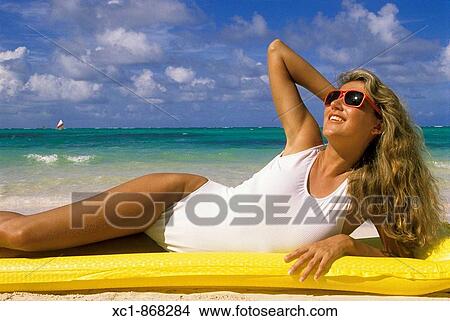 Woman on beach, Punta Cana, Dominican Republic, Caribbean View Large Photo Image Picture - Woman on beach, Punta Cana, Dominican Republic, Caribbean. Fotosearch