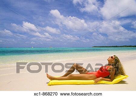 Woman on beach, Punta Cana, Dominican Republic, Caribbean View Large Photo Image Stock Image - Woman on beach, Punta Cana, Dominican Republic, Caribbean. Fotosearch