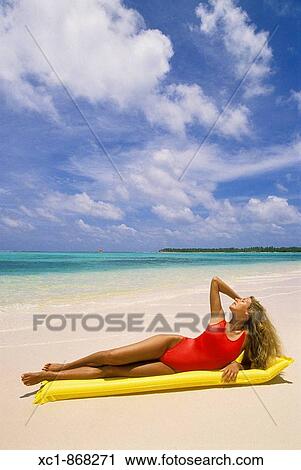Woman on beach, Punta Cana, Dominican Republic, Caribbean View Large Photo Image Stock Image - Woman on beach, Punta Cana, Dominican Republic, Caribbean. Fotosearch