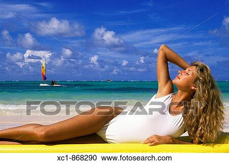 Woman on beach, Punta Cana, Dominican Republic, Caribbean View Large Photo Image Stock Image - Woman on beach, Punta Cana, Dominican Republic, Caribbean. Fotosearch