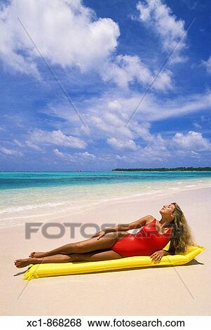 Woman on beach, Punta Cana, Dominican Republic, Caribbean View Large Photo Image Stock Photo - Woman on beach, Punta Cana, Dominican Republic, Caribbean. Fotosearch