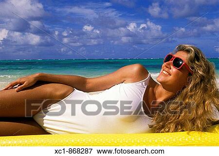 Woman on beach, Punta Cana, Dominican Republic, Caribbean View Large Photo Image Stock Photo - Woman on beach, Punta Cana, Dominican Republic, Caribbean. Fotosearch