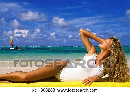 Woman on beach, Punta Cana, Dominican Republic, Caribbean View Large Photo Image Stock Photo - Woman on beach, Punta Cana, Dominican Republic, Caribbean. Fotosearch