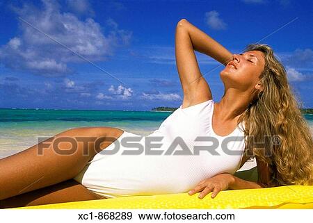 Woman on beach, Punta Cana, Dominican Republic, Caribbean View Large Photo Image Stock Photo - Woman on beach, Punta Cana, Dominican Republic, Caribbean. Fotosearch