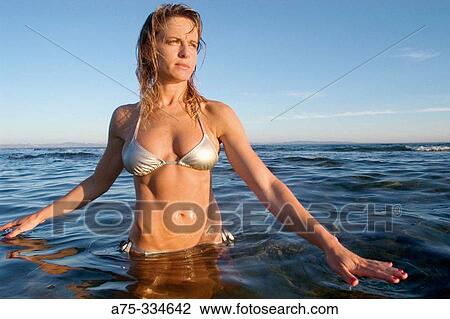 Woman on beach View Large Photo Image Stock Image - Woman on beach. Fotosearch
