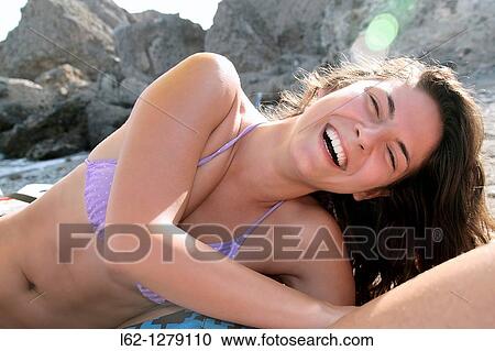 Woman on beach View Large Photo Image Stock Image - Woman on beach. Fotosearch