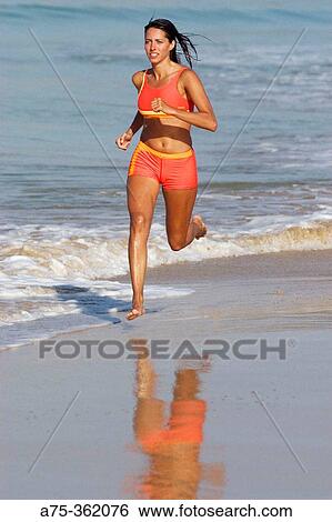 Woman on beach View Large Photo Image Stock Photograph - Woman on beach. Fotosearch