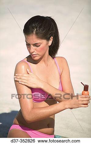 Stock Photograph - Woman on beach. Fotosearch