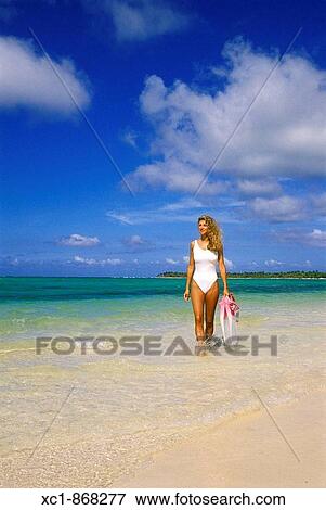 Woman on beach with snorkeling gear, Punta Cana, Dominican Republic, Caribbean View Large Photo Image Stock Photo - Woman on beach with snorkeling gear, Punta Cana, Dominican Republic, Caribbean. Fotosearch