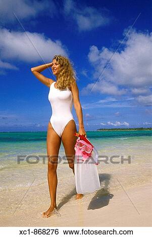 Woman on beach with snorkeling gear, Punta Cana, Dominican Republic, Caribbean View Large Photo Image Stock Photograph - Woman on beach with snorkeling gear, Punta Cana, Dominican Republic, Caribbean. Fotosearch
