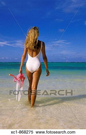 Woman on beach with snorkeling gear, Punta Cana, Dominican Republic, Caribbean View Large Photo Image Stock Photography - Woman on beach with snorkeling gear, Punta Cana, Dominican Republic, Caribbean. Fotosearch