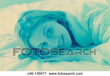 Woman on bed View Large Photo Image Stock Image - Woman on bed. Fotosearch