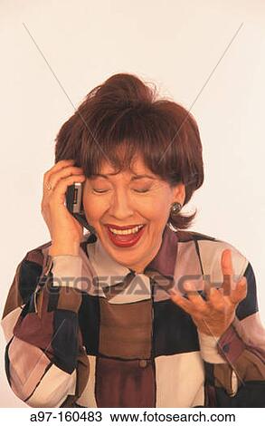 Woman on cell phone, bolivian View Large Photo Image Stock Image - Woman on cell phone, bolivian. Fotosearch