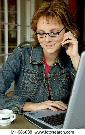 Woman on cell phone View Large Photo Image Stock Photo - Woman on cell phone. Fotosearch