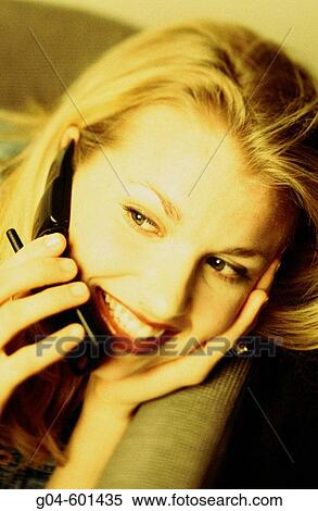 Woman on cell phone View Large Photo Image Stock Photography - Woman on cell phone. Fotosearch