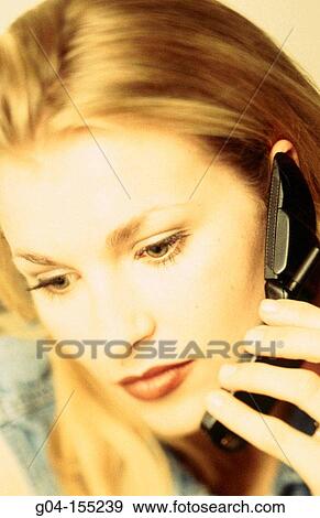 Woman on cellphone View Large Photo Image Stock Photo - Woman on cellphone. Fotosearch