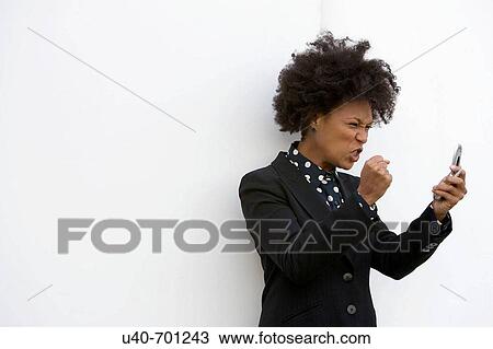 Woman on cellular phone View Large Photo Image Stock Image - Woman on cellular phone. Fotosearch