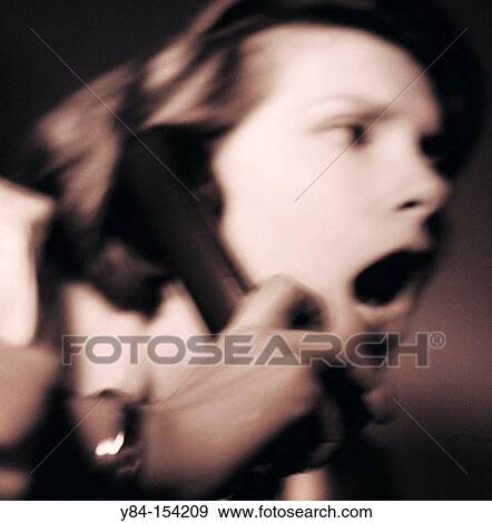 Woman on phone View Large Photo Image Stock Photo - Woman on phone. Fotosearch