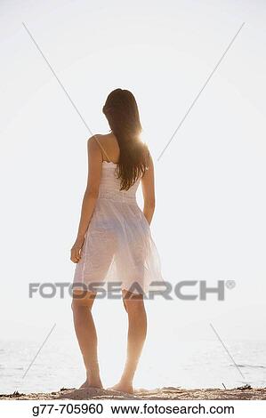 Woman on the beach. Key Biscayne, Florida, USA View Large Photo Image Stock Image - Woman on the beach. Key Biscayne, Florida, USA. Fotosearch
