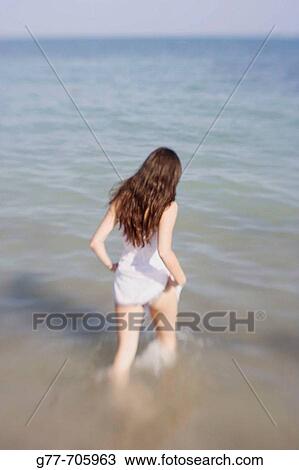 Woman on the beach. Key Biscayne, Florida, USA View Large Photo Image Stock Image - Woman on the beach. Key Biscayne, Florida, USA. Fotosearch