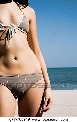 Stock Photo - Woman on the beach. Key Biscayne, Florida, USA. Fotosearch