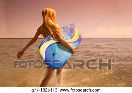 Woman on the beach. Miami Beach, Florida, USA View Large Photo Image Stock Image - Woman on the beach. Miami Beach, Florida, USA. Fotosearch