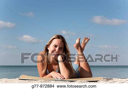 Woman on the beach, Miami, Florida, USA View Large Photo Image Picture - Woman on the beach, Miami, Florida, USA. Fotosearch