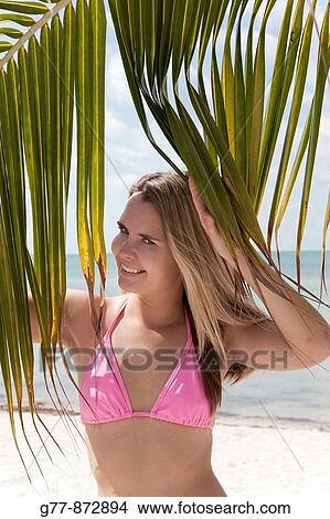 Woman on the beach, Miami, Florida, USA View Large Photo Image Picture - Woman on the beach, Miami, Florida, USA. Fotosearch