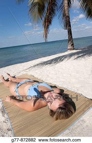 Woman on the beach, Miami, Florida, USA View Large Photo Image Stock Image - Woman on the beach, Miami, Florida, USA. Fotosearch