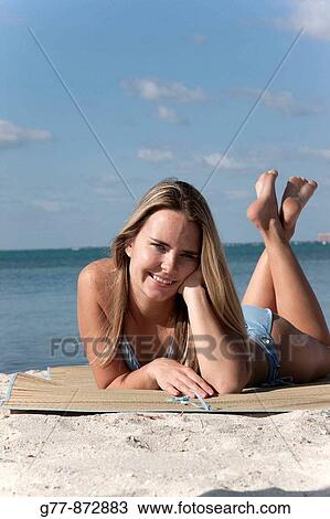 Woman on the beach, Miami, Florida, USA View Large Photo Image Stock Image - Woman on the beach, Miami, Florida, USA. Fotosearch