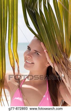 Stock Image - Woman on the beach, Miami, Florida, USA. Fotosearch