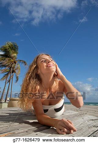 Woman on the beach, Miami, Florida, USA View Large Photo Image Stock Photo - Woman on the beach, Miami, Florida, USA. Fotosearch